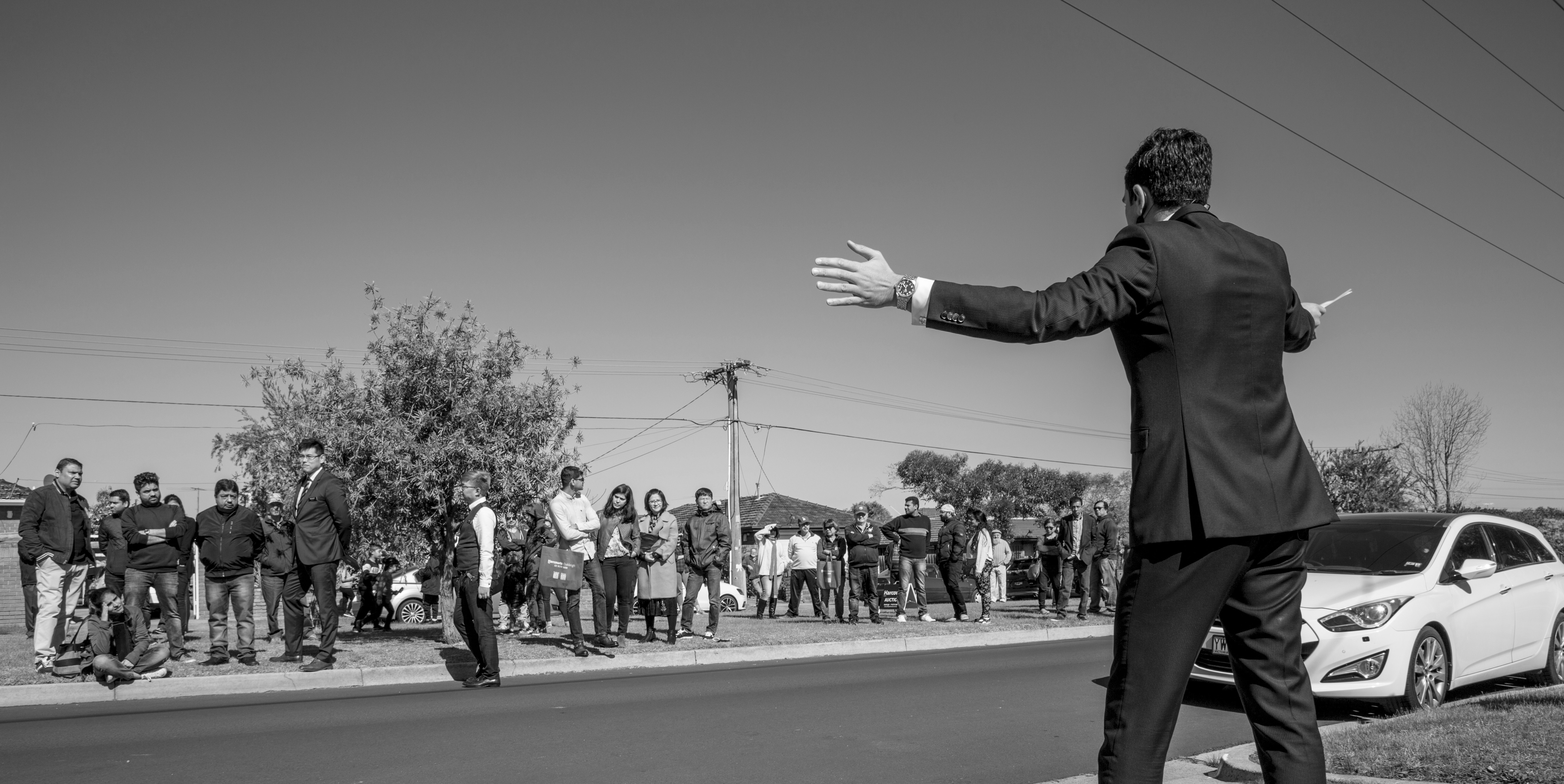 Auctioneer on the rostrum at a Melbourne property auction